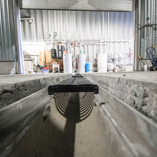  | Pre-sloped 4" trench drain for Zamboni bay at Langley Sportsplex | Commercial Concrete Work 