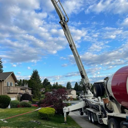  | Our boom concrete pump truck in action and it is dispersing large volumes of concrete with pinpoint accuracy. | Concrete Driveways 