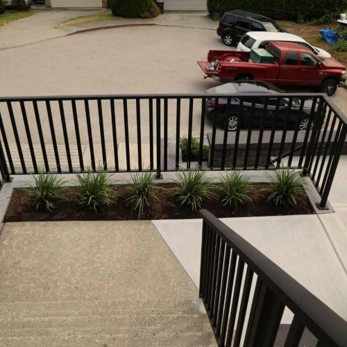  | Concrete stairs, block walls, broom-finish landing / stepping area and railing installations | Concrete Form Work and Foundations 